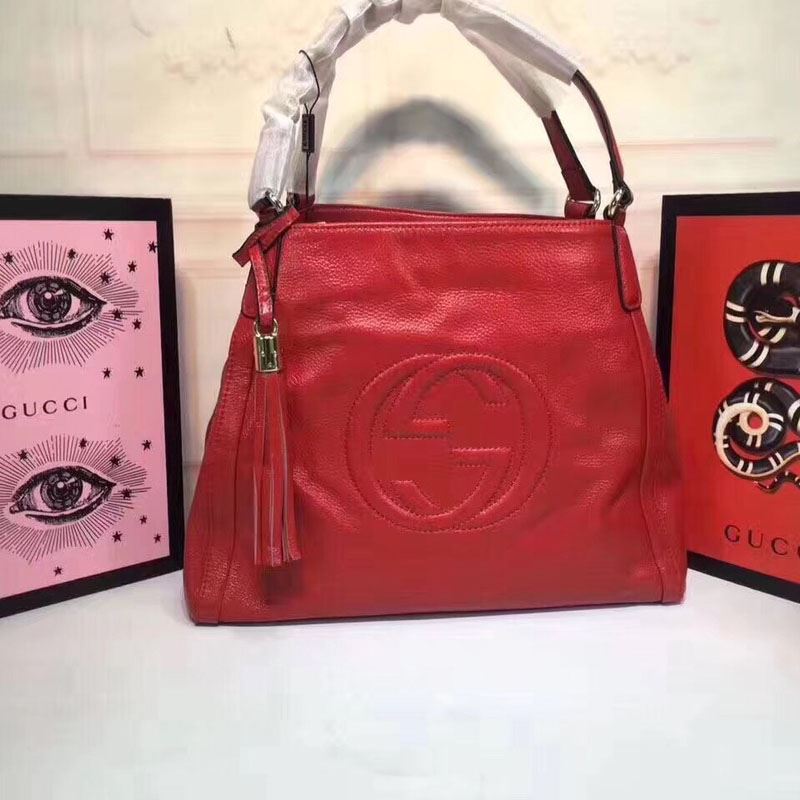 G*u*i top handle bags